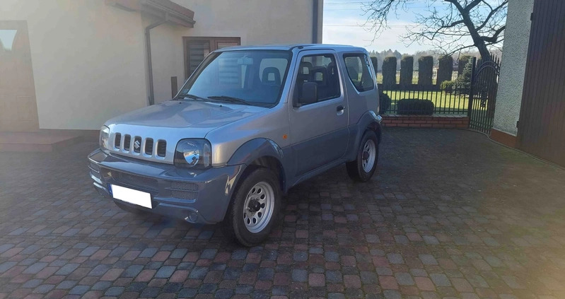 Suzuki Jimny cena 35700 przebieg: 155460, rok produkcji 2011 z Nidzica małe 211